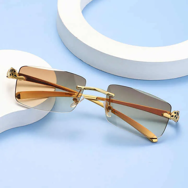 نظارات شمسية أنيقة كلاسيكية بدون إطار مربعة . Classic Fashion Rimless Square Sunglasses for Women