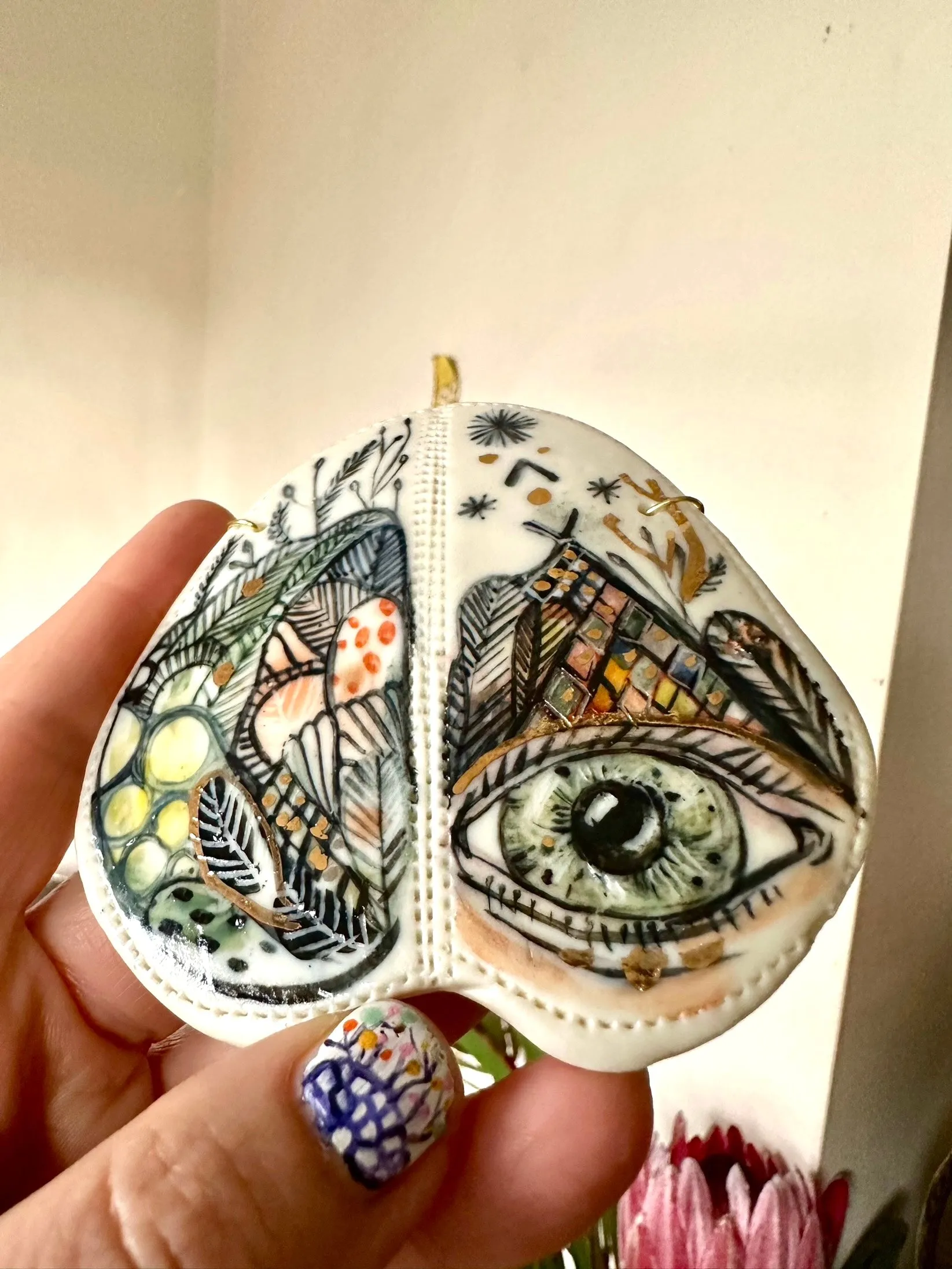 ‘Moth, protective eye’ porcelain wall piece, small gold lustre detail